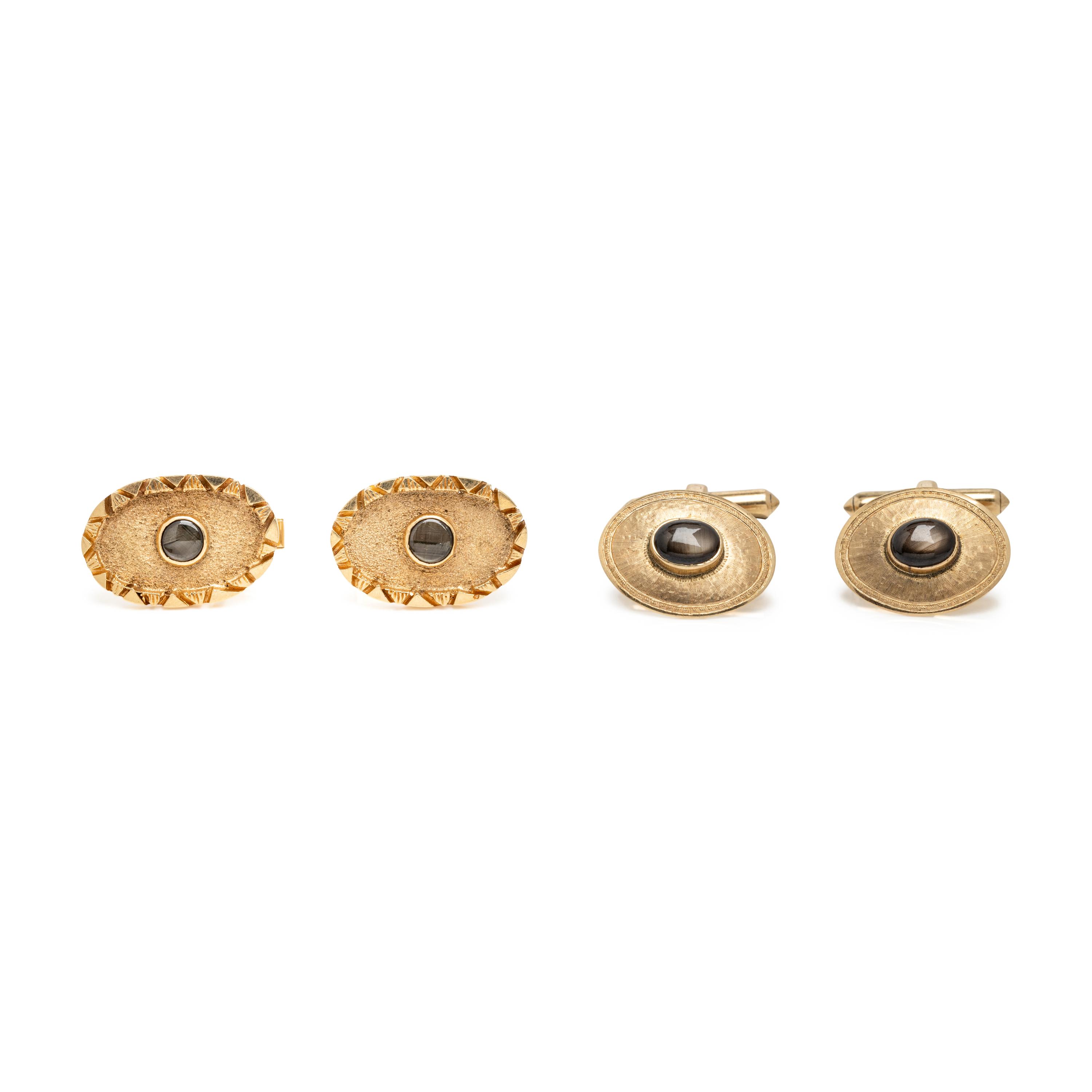 TWO PAIRS OF YELLOW GOLD AND BLACK STAR SAPPHIRE CUFFLINKS