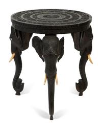 An Anglo-Indian Carved Teak Elephant-Leg Table — 19TH/20TH CENTURY