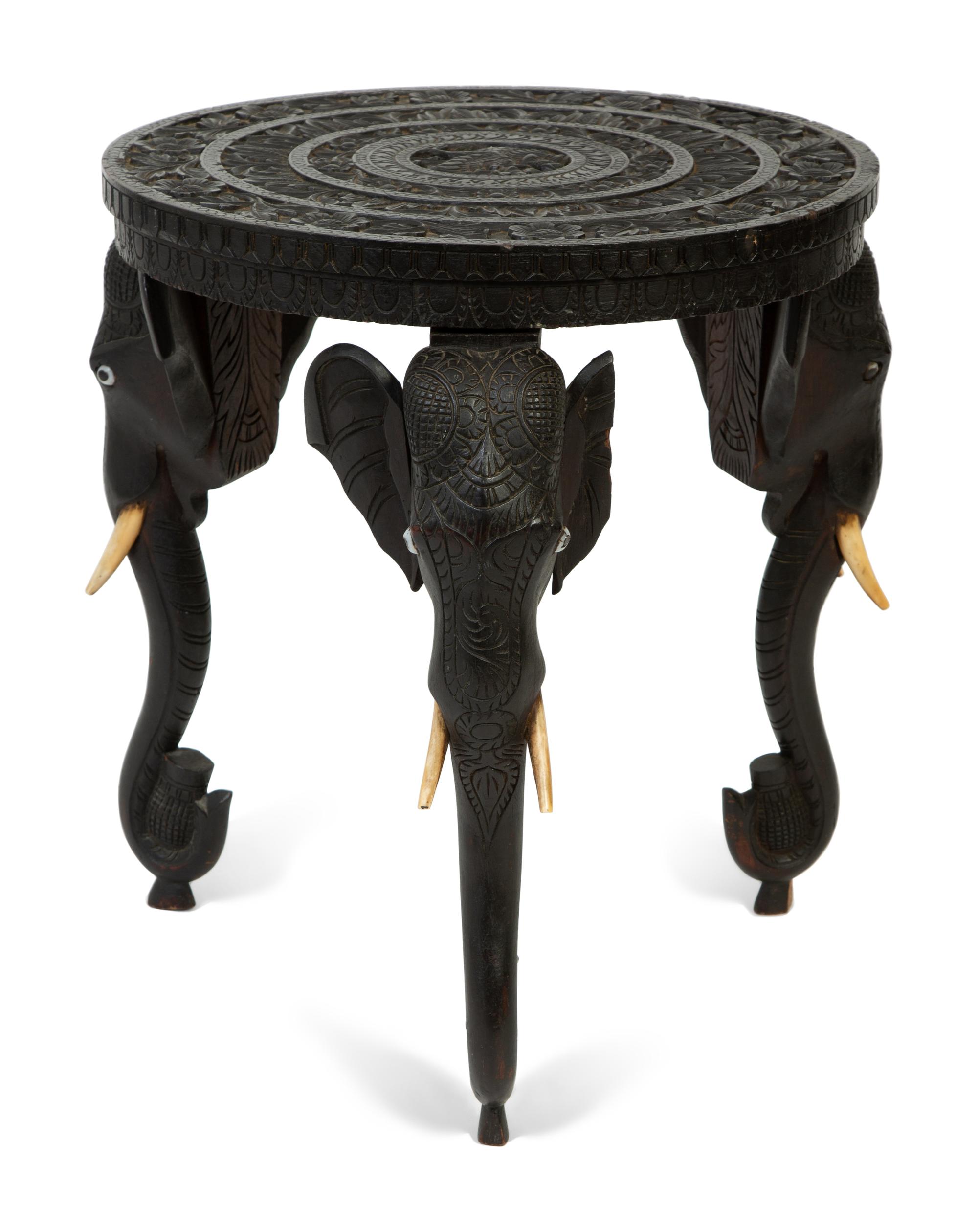 An Anglo-Indian Carved Teak Elephant-Leg Table — 19TH/20TH CENTURY