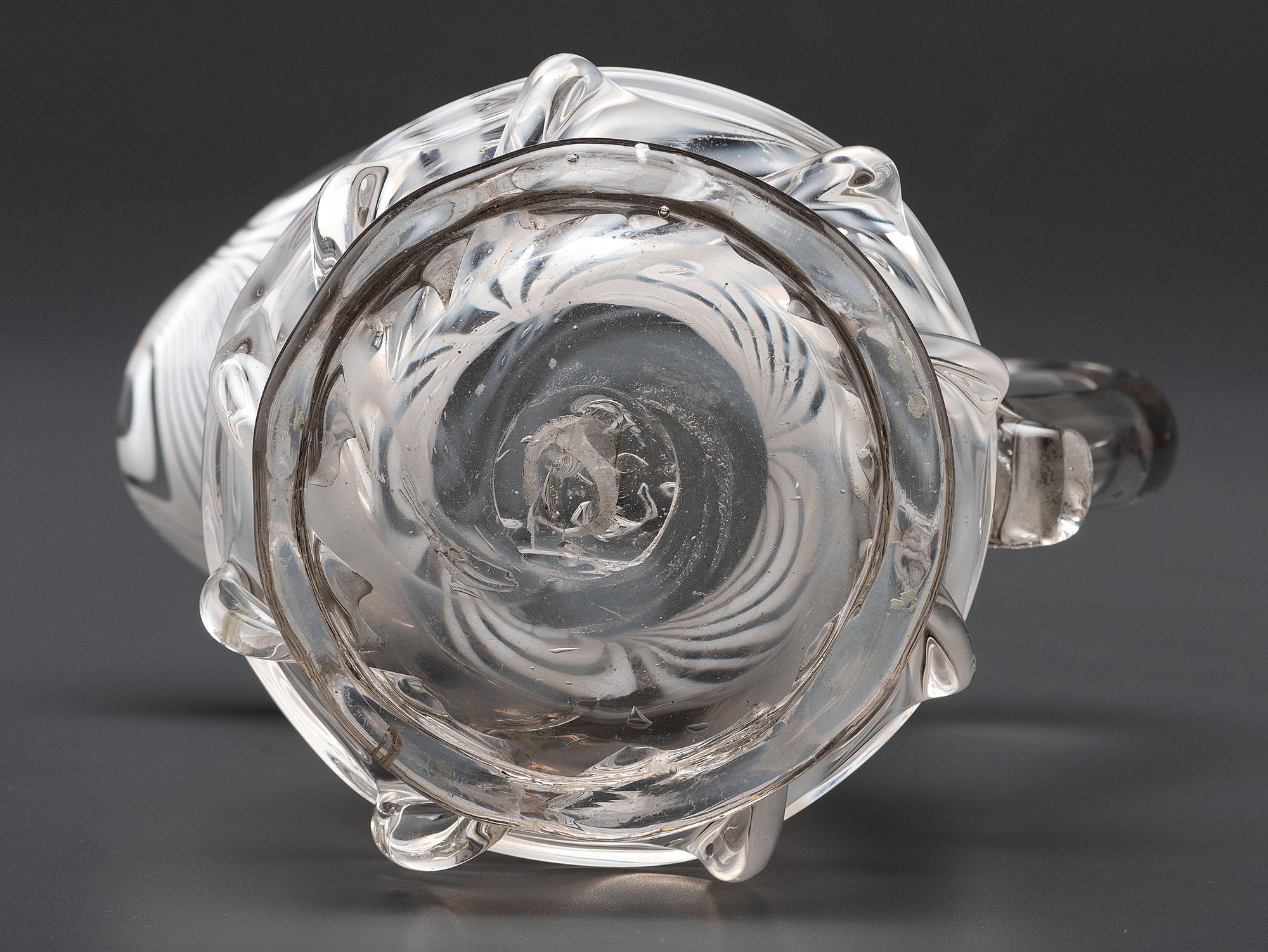 A New Jersey Blown-Glass Pitcher in Clear with White Swirls