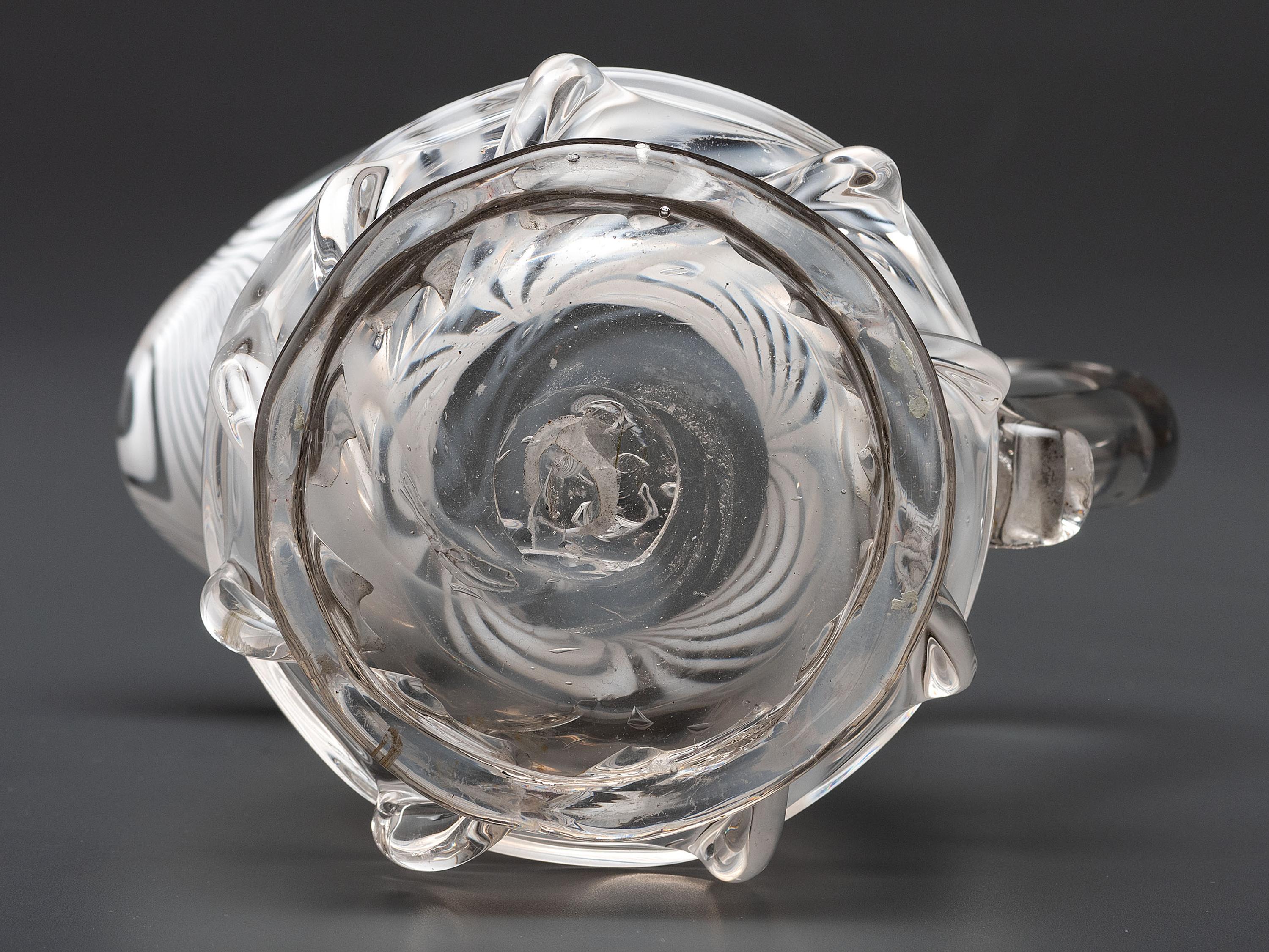 A New Jersey Blown-Glass Pitcher in Clear with White Swirls
