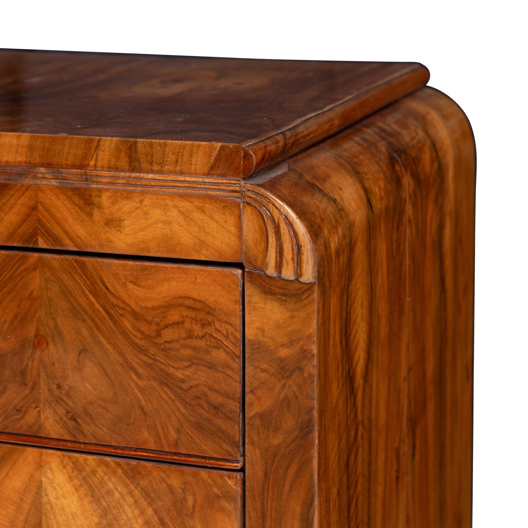 A Pair of Austrian Walnut Commodes