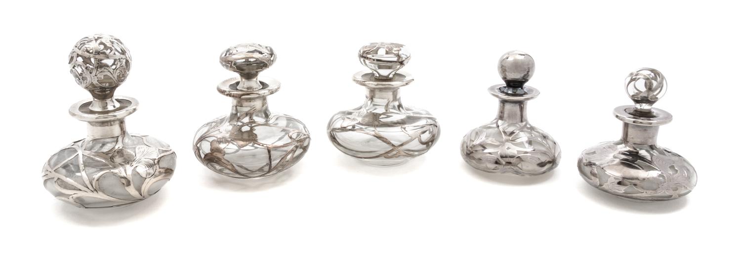 A Group of Five Silver Overlay Glass Bottles Height 3 3/4 inches.