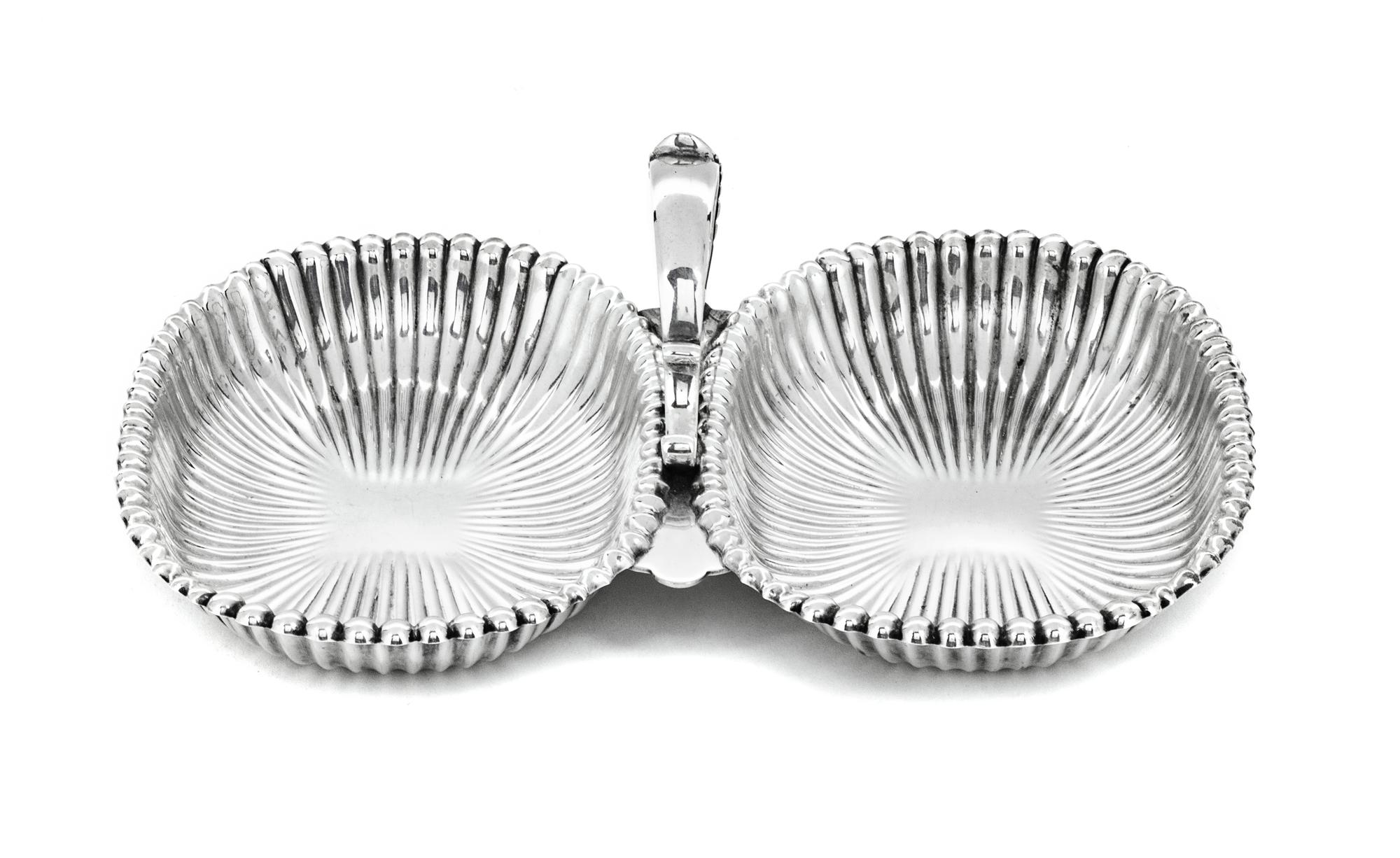 An Amerian Silver Double Salt Cellar, Gorham Mfg. Co., Providence, RI, with handle in center.