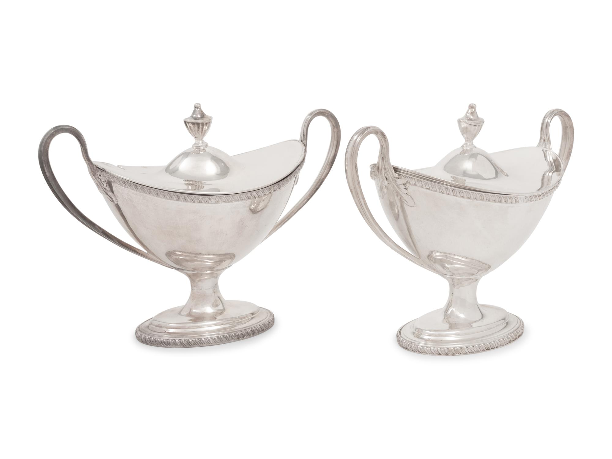 A Pair of Silver-Plate Sauce Tureens and Two Silver-Plate Warmers