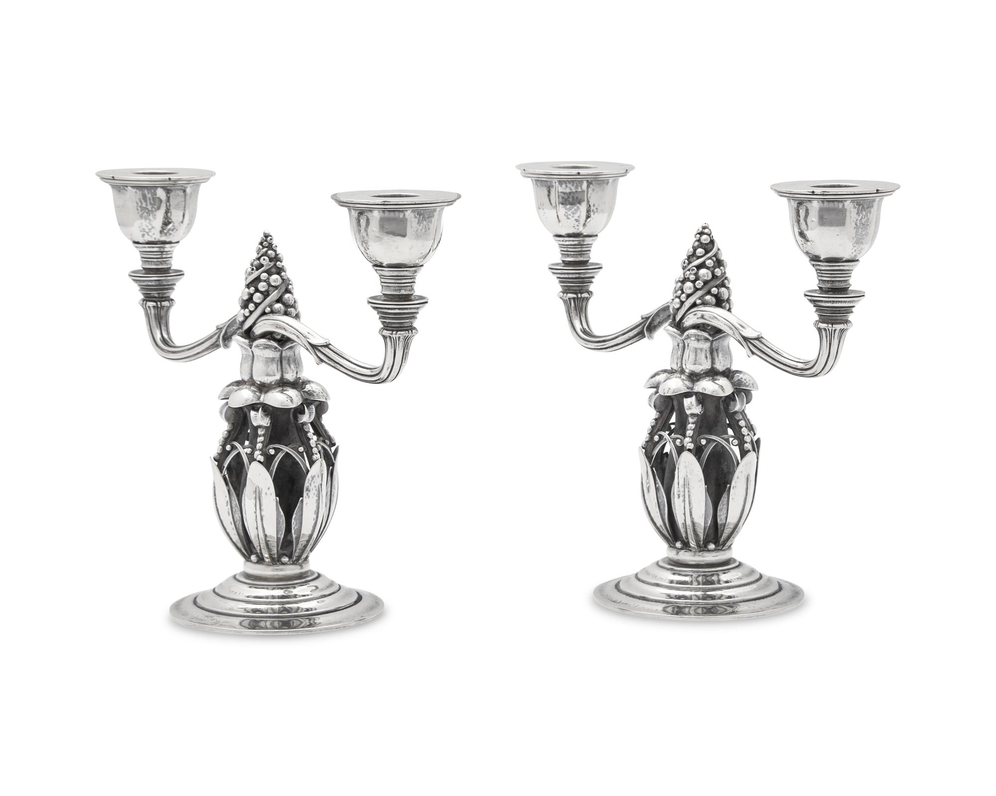A Pair of Georg Jensen Silver Two-Light Candelabra