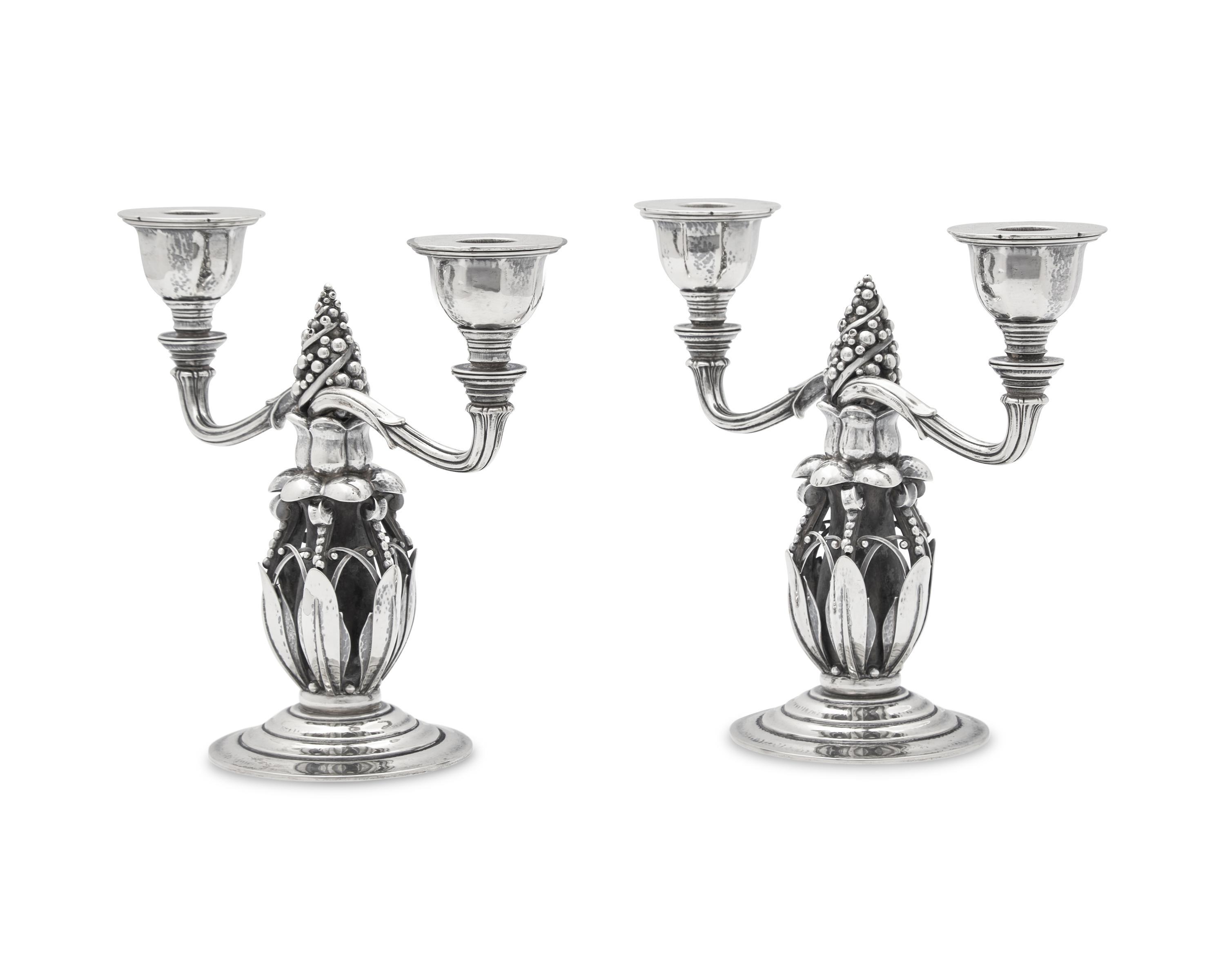 A Pair of Georg Jensen Silver Two-Light Candelabra