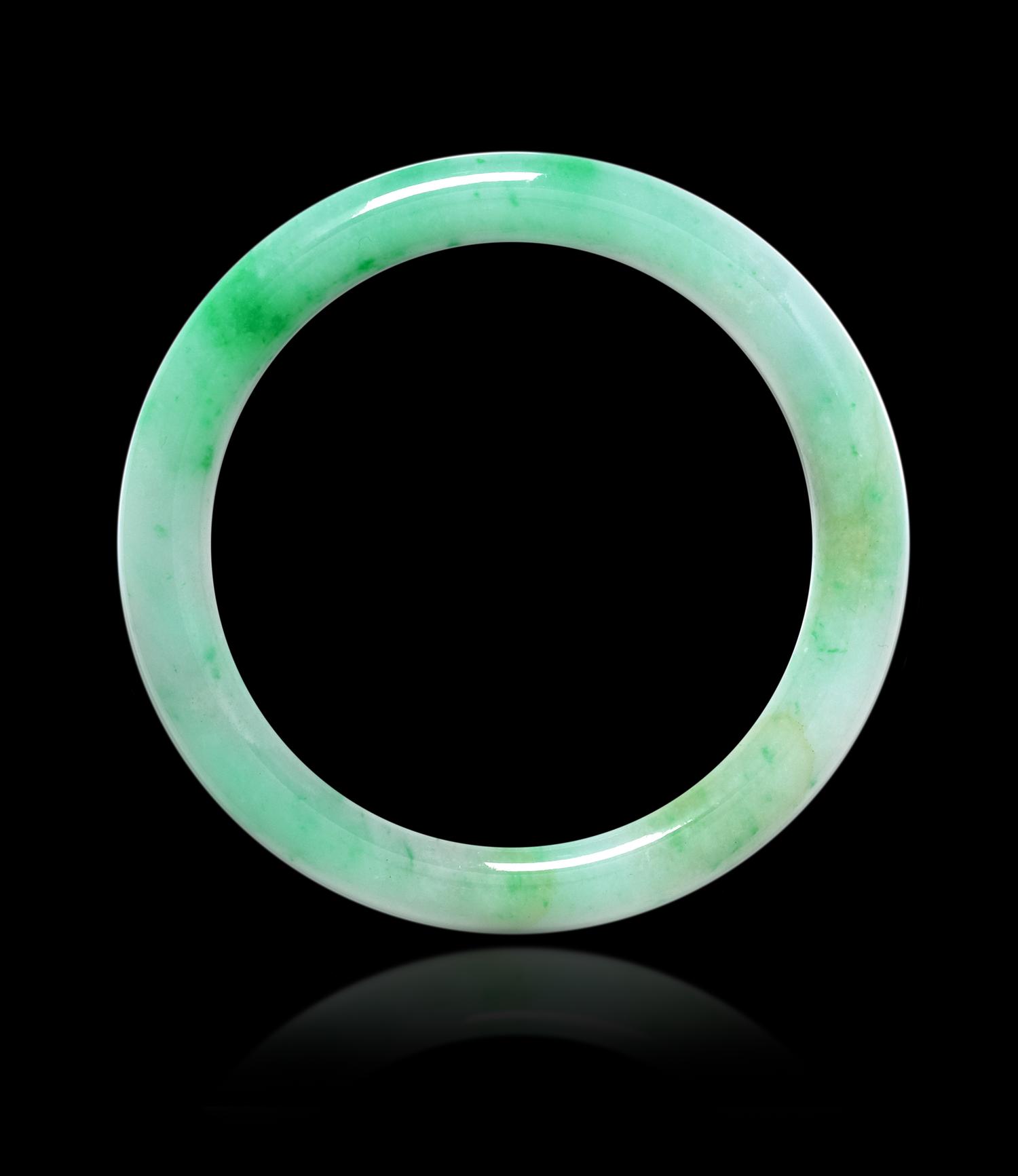 An Apple Green and Celadon Jadeite Bangle