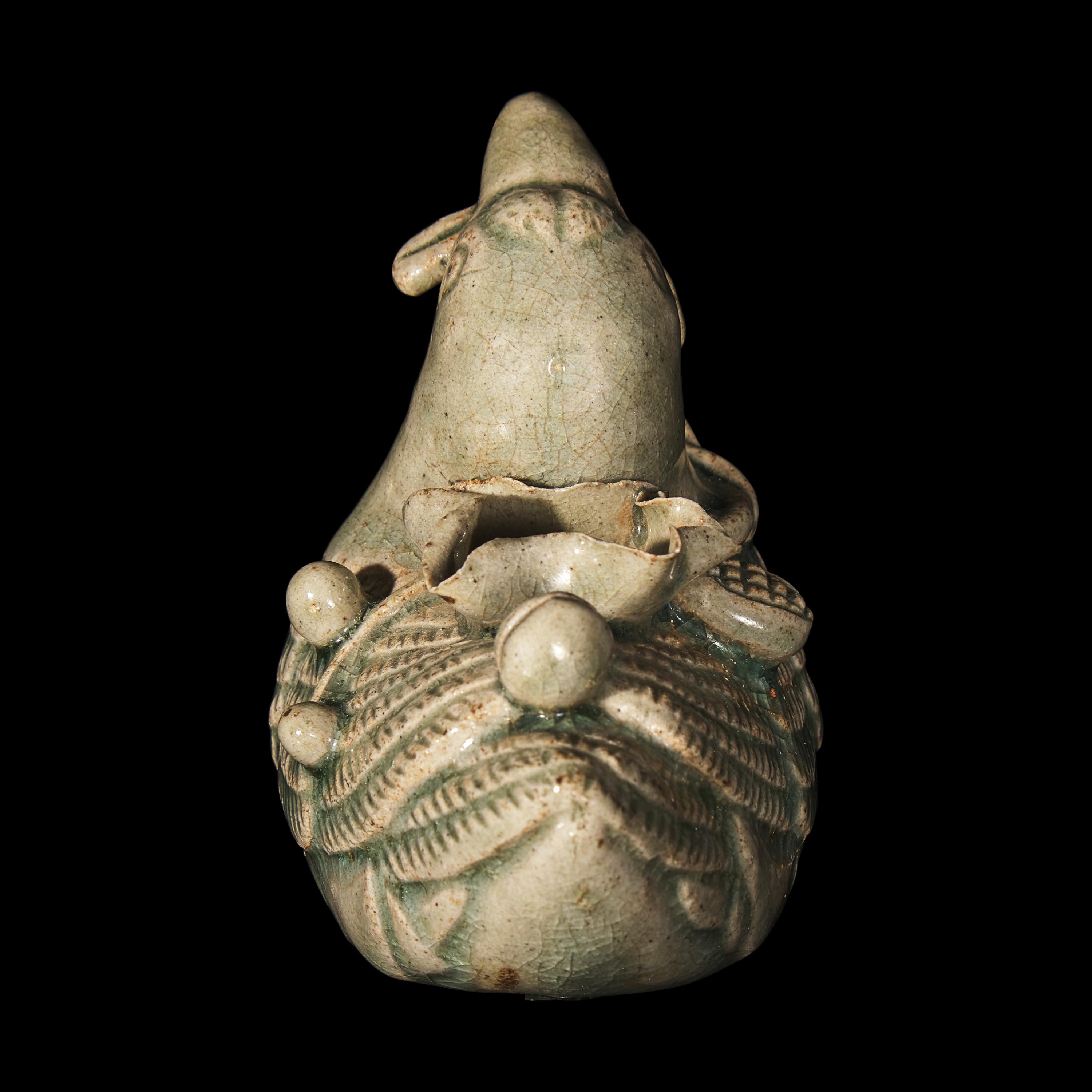 A Korean Celadon Glazed Porcelain Duck-Form Water Dropper 青釉鴨形硯滴