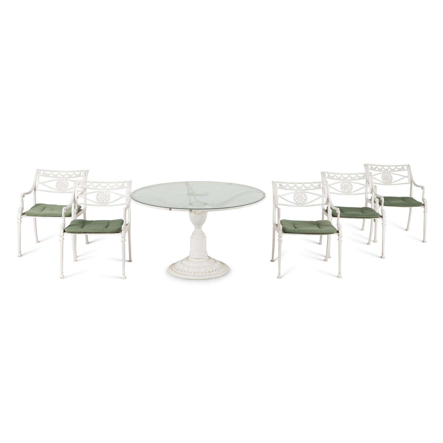 A White-Painted Cast Iron Outdoor Dining Suite