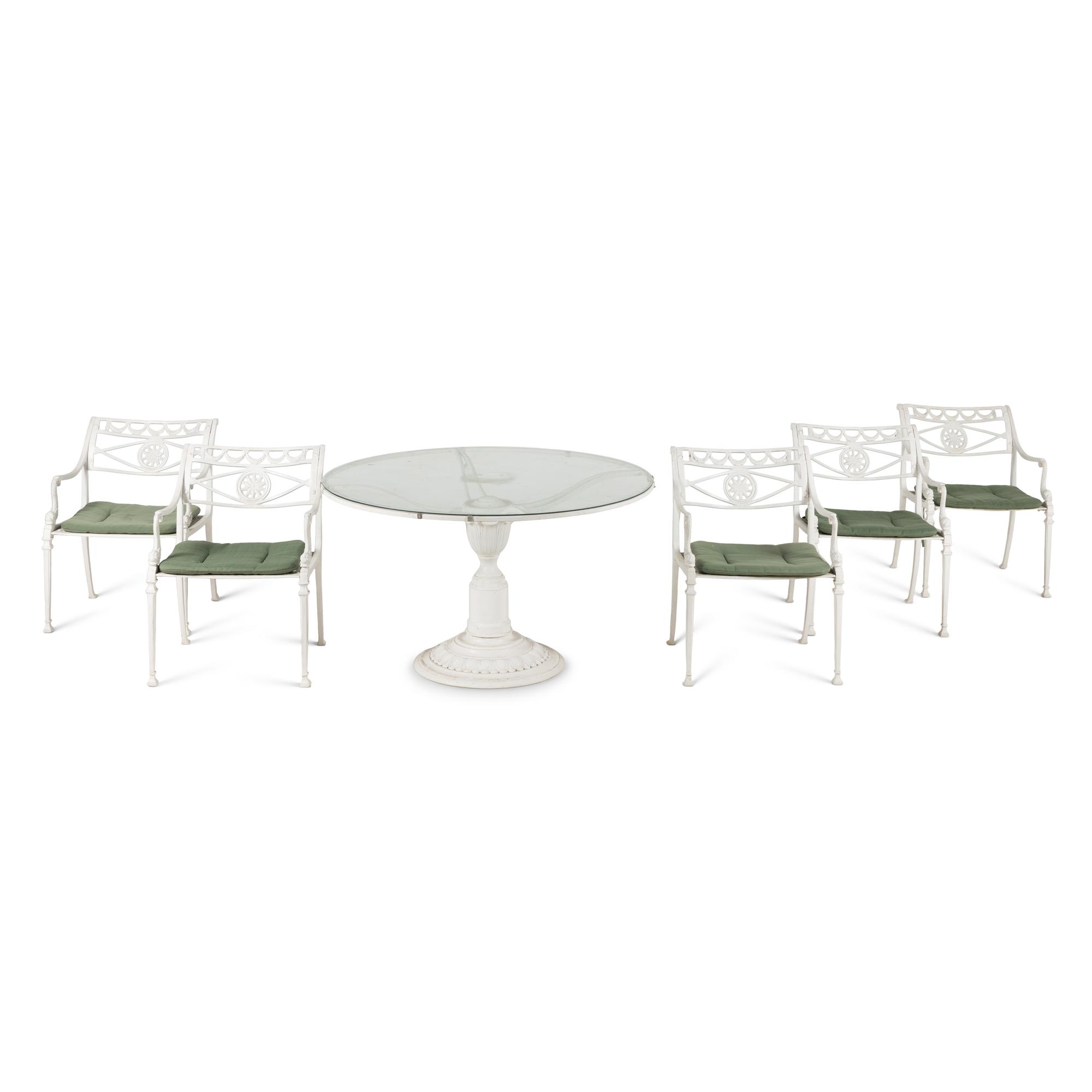 A White-Painted Cast Iron Outdoor Dining Suite
