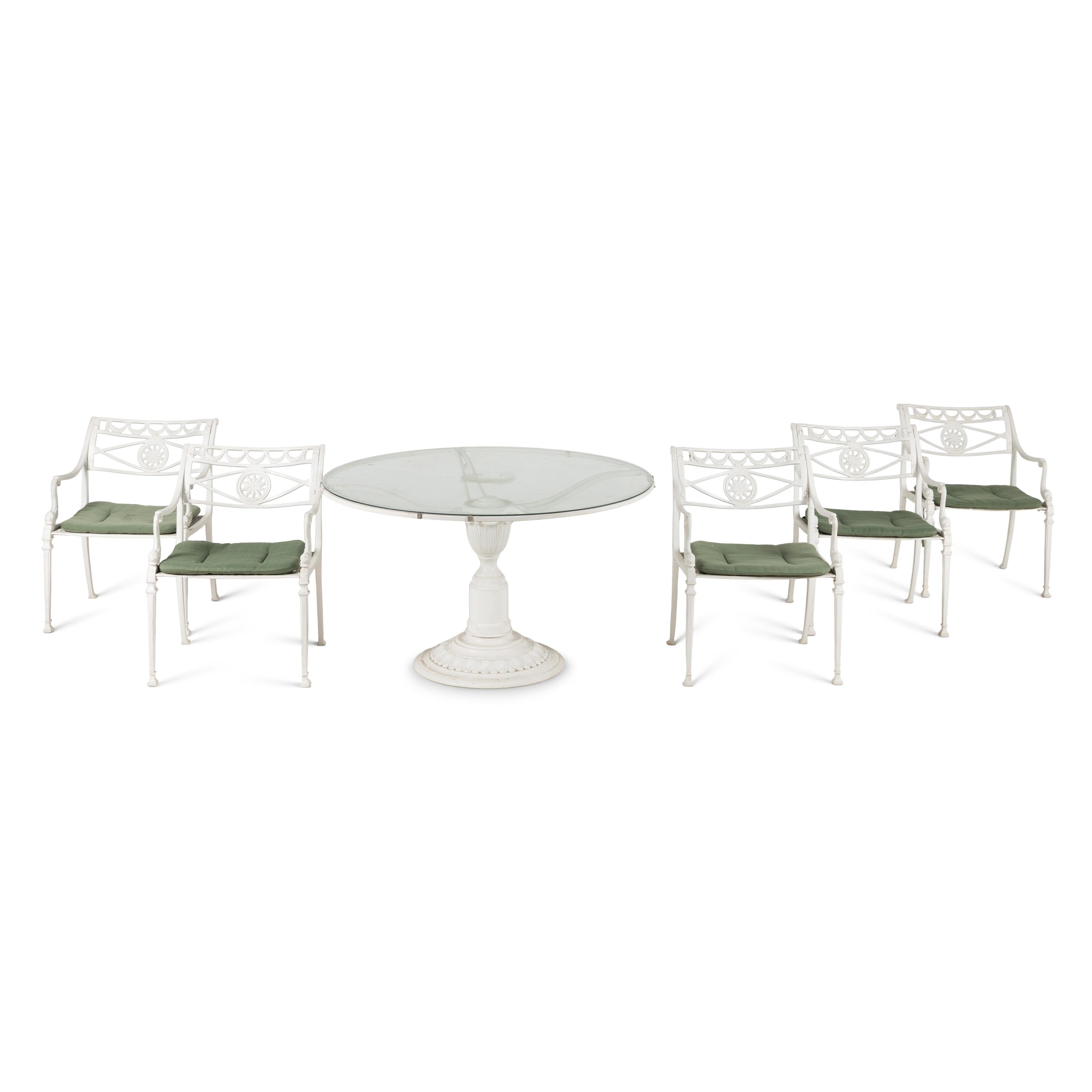 A White-Painted Cast Iron Outdoor Dining Suite