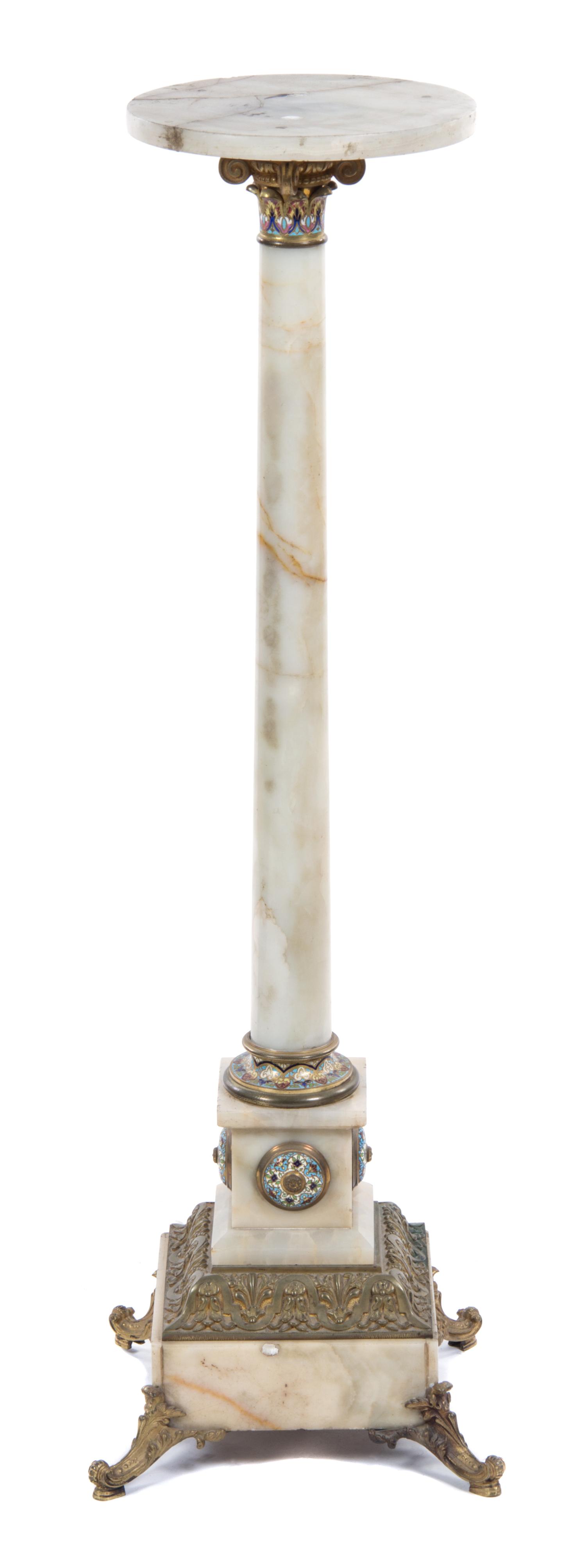 A Continental Champleve Decorated and Gilt Bronze Mounted Onyx Pedestal, Height 46 inches.