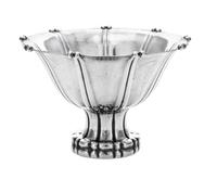 A Danish Silver Compote, Georg Jensen Silversmithy, Copenhagen, Circa 1925, the tapered circular bowl with a knopped rim and raised on