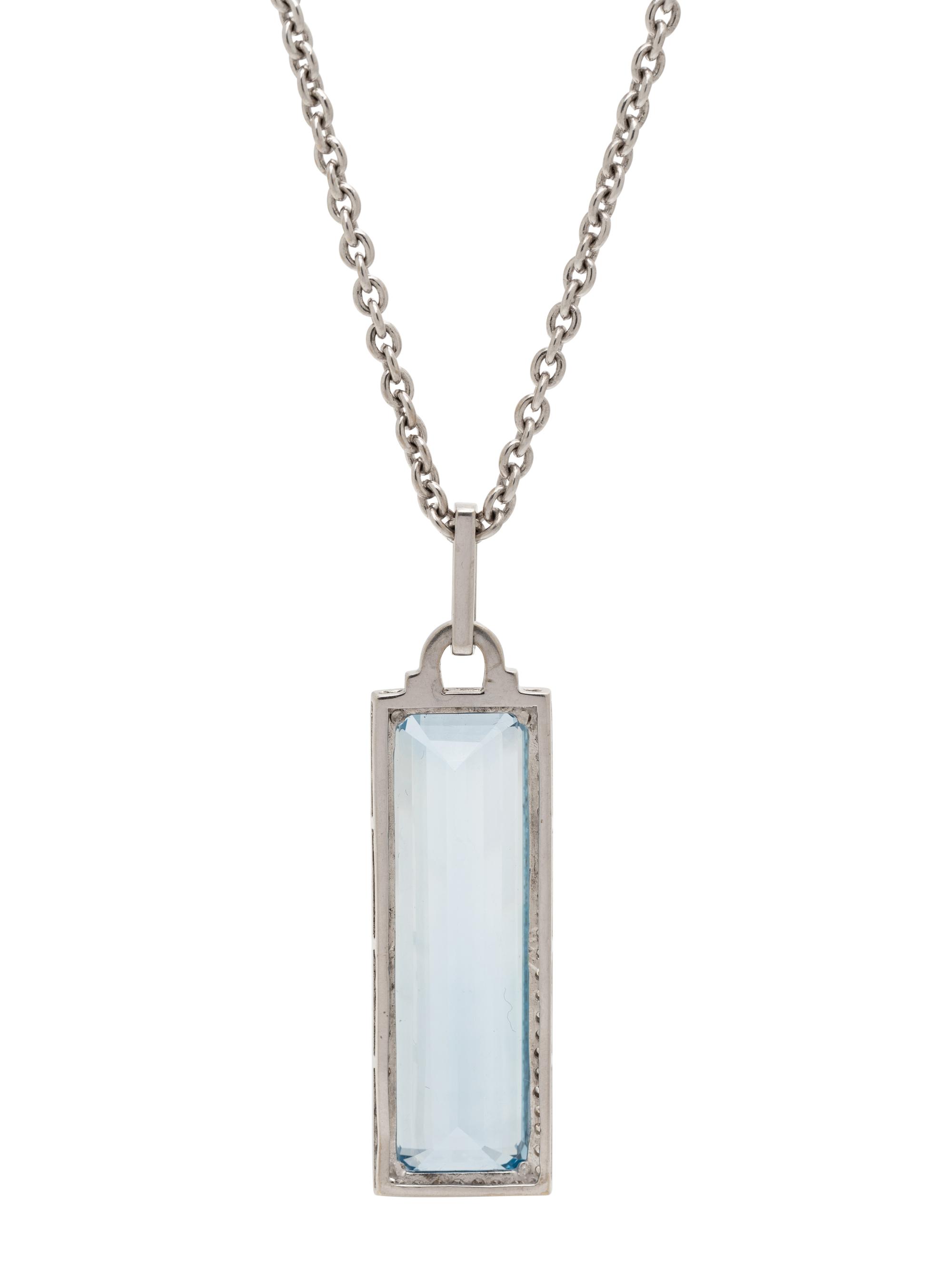 WHITE GOLD, SYNTHETIC SPINEL AND DIAMOND PENDANT/NECKLACE