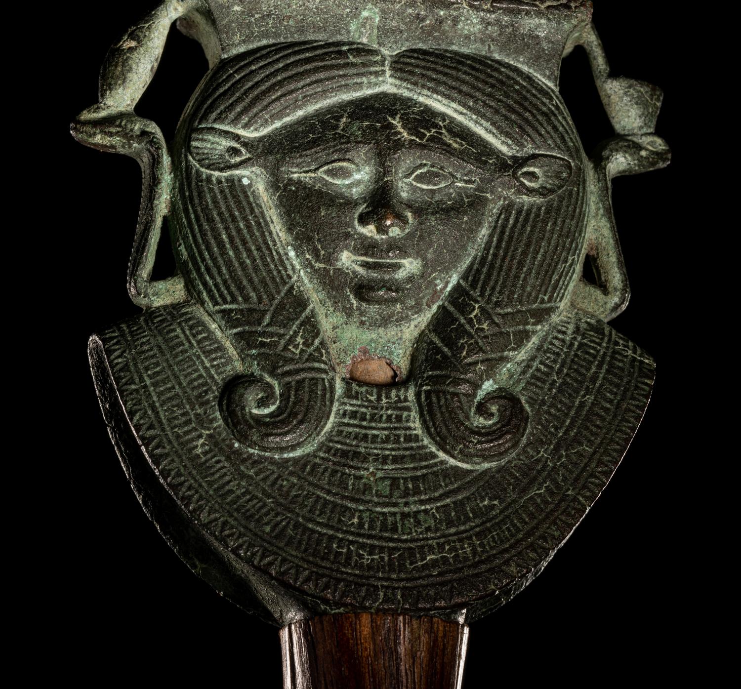An Egyptian Bronze Hathor Sistrum Terminal