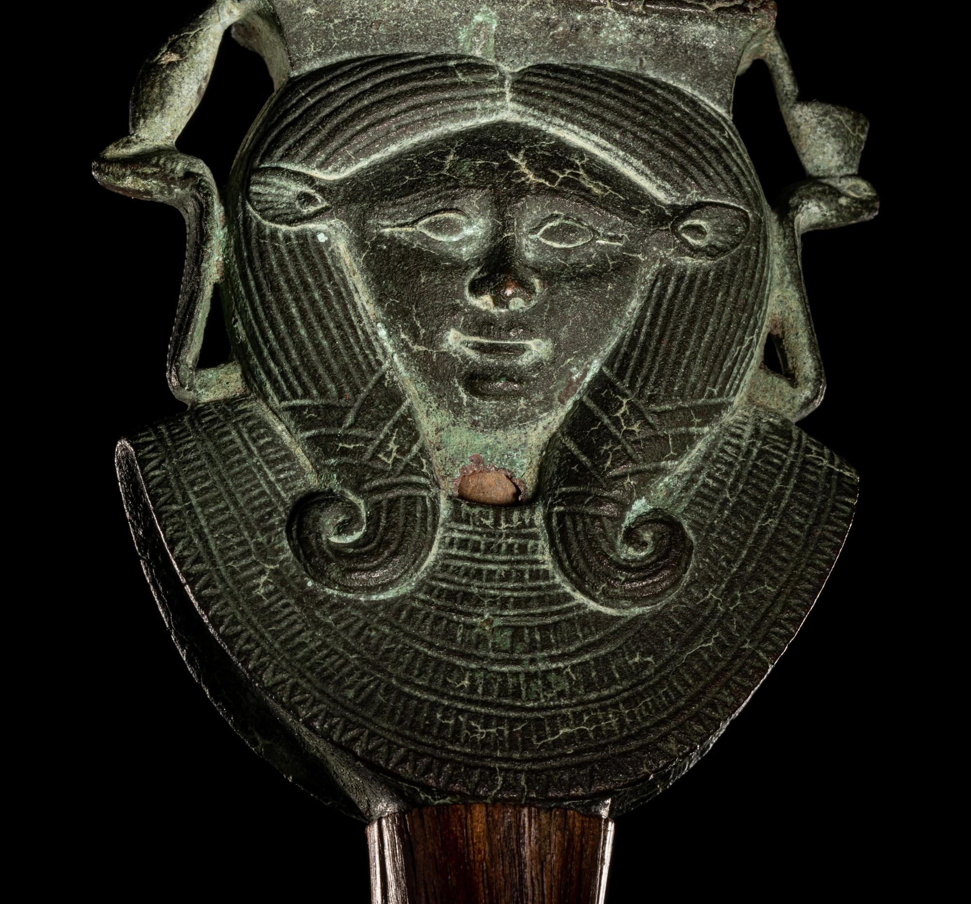 An Egyptian Bronze Hathor Sistrum Terminal