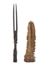 An African Wooden Figure with Bird Headdress
