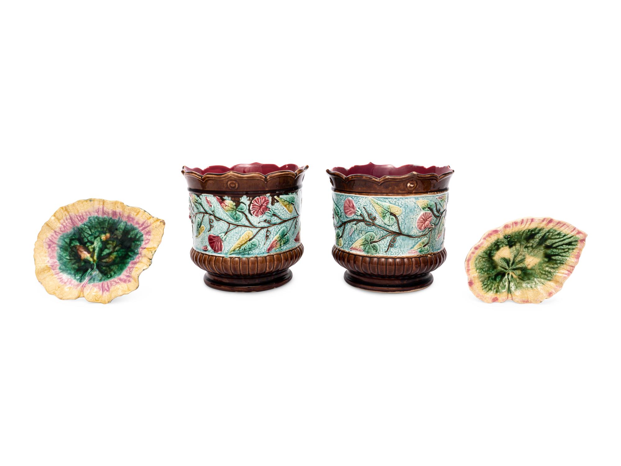 A Pair of Majolica Cache Pots and Two Majolica Leaf-Form Dishes