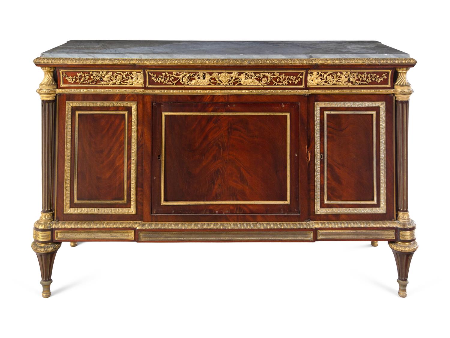 A Louis XVI Style Gilt Bronze Mounted Mahogany Marble-Top Cabinet After the Model by Jean-Henri Riesener (German, 1734-1806)