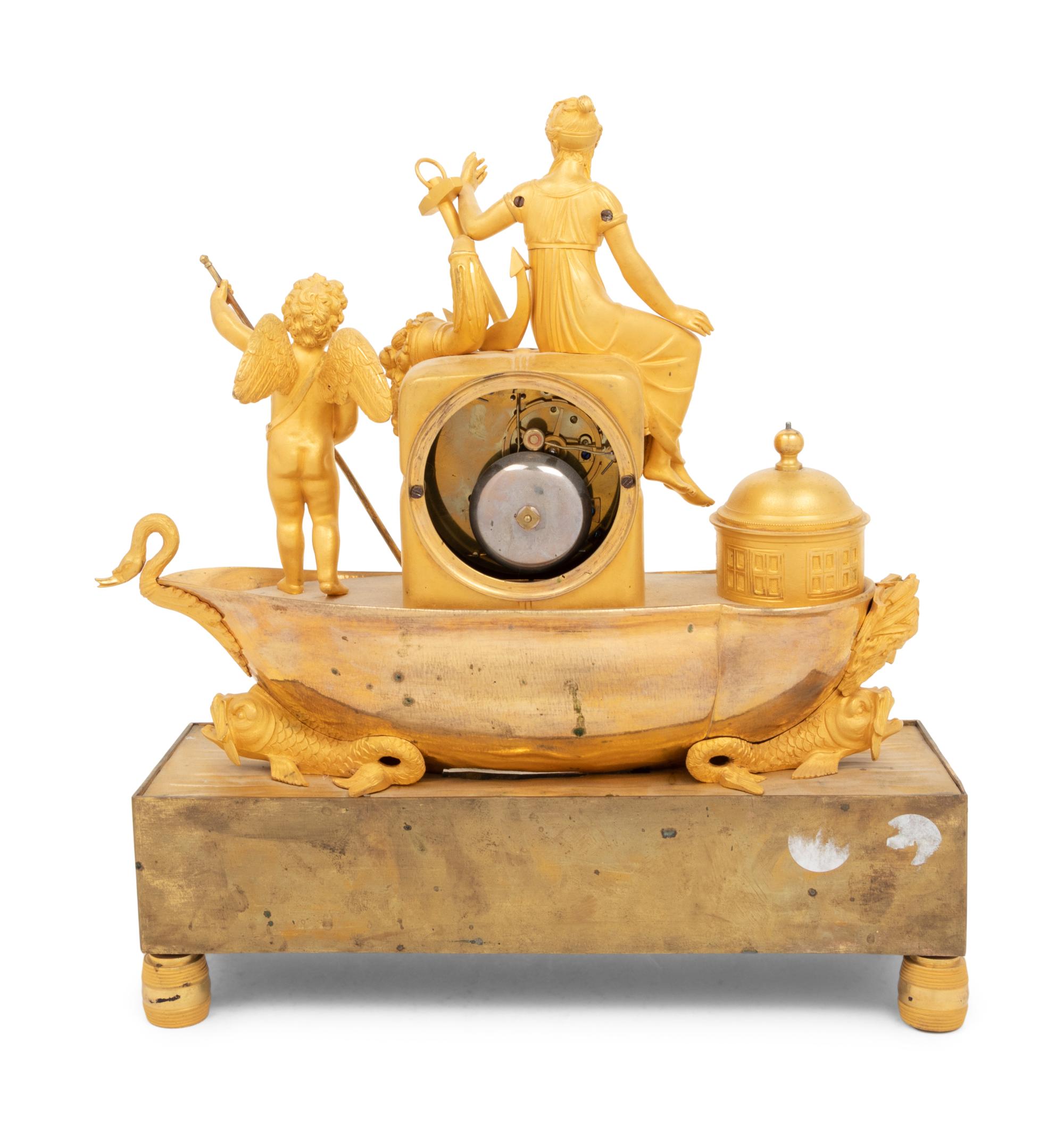 An Empire Gilt Bronze Figural Mantel Clock