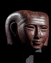 A Roman Porphyry Head of an Egyptian Woman