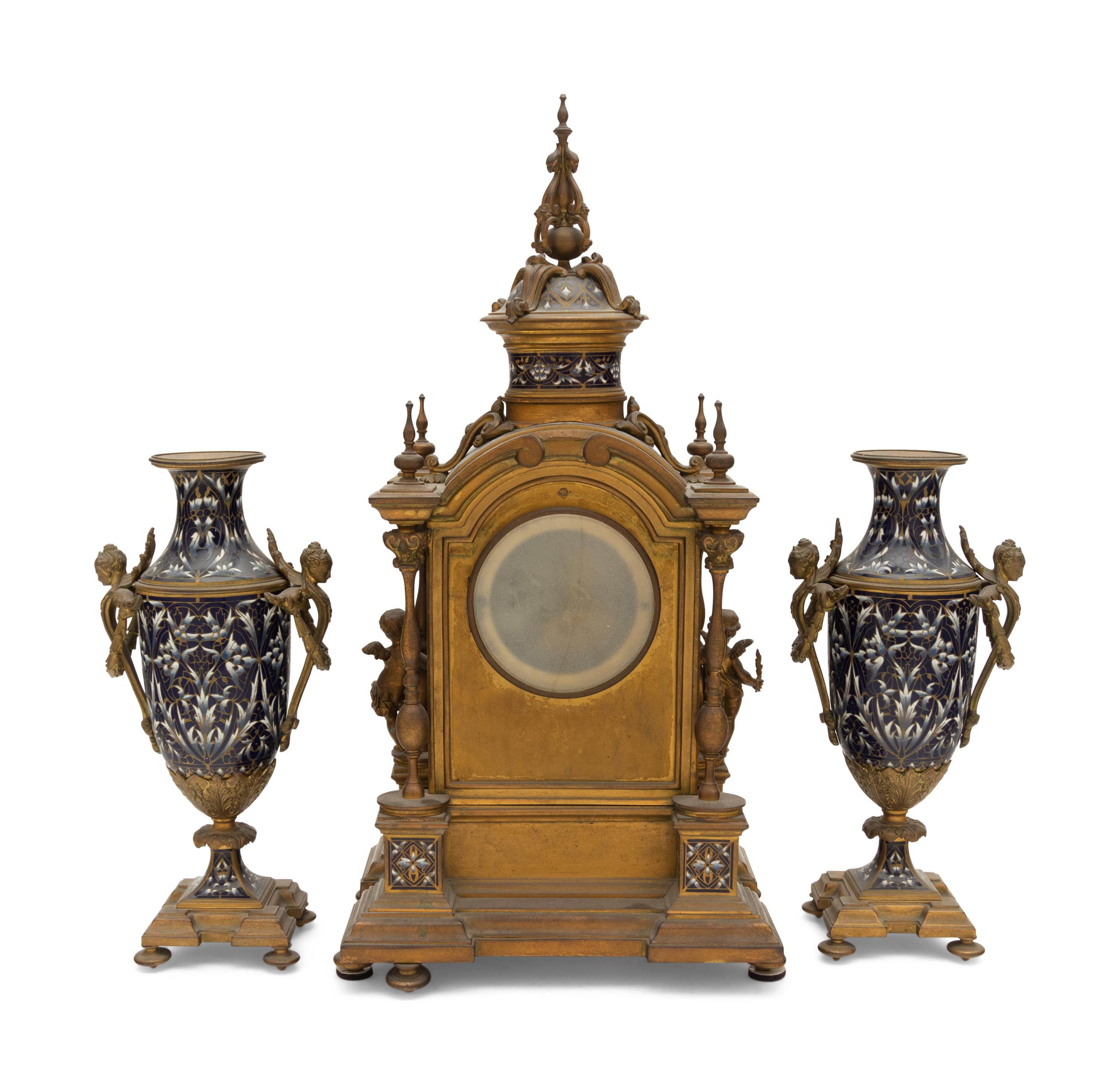 A French Gilt Bronze and Enamel Clock Garniture