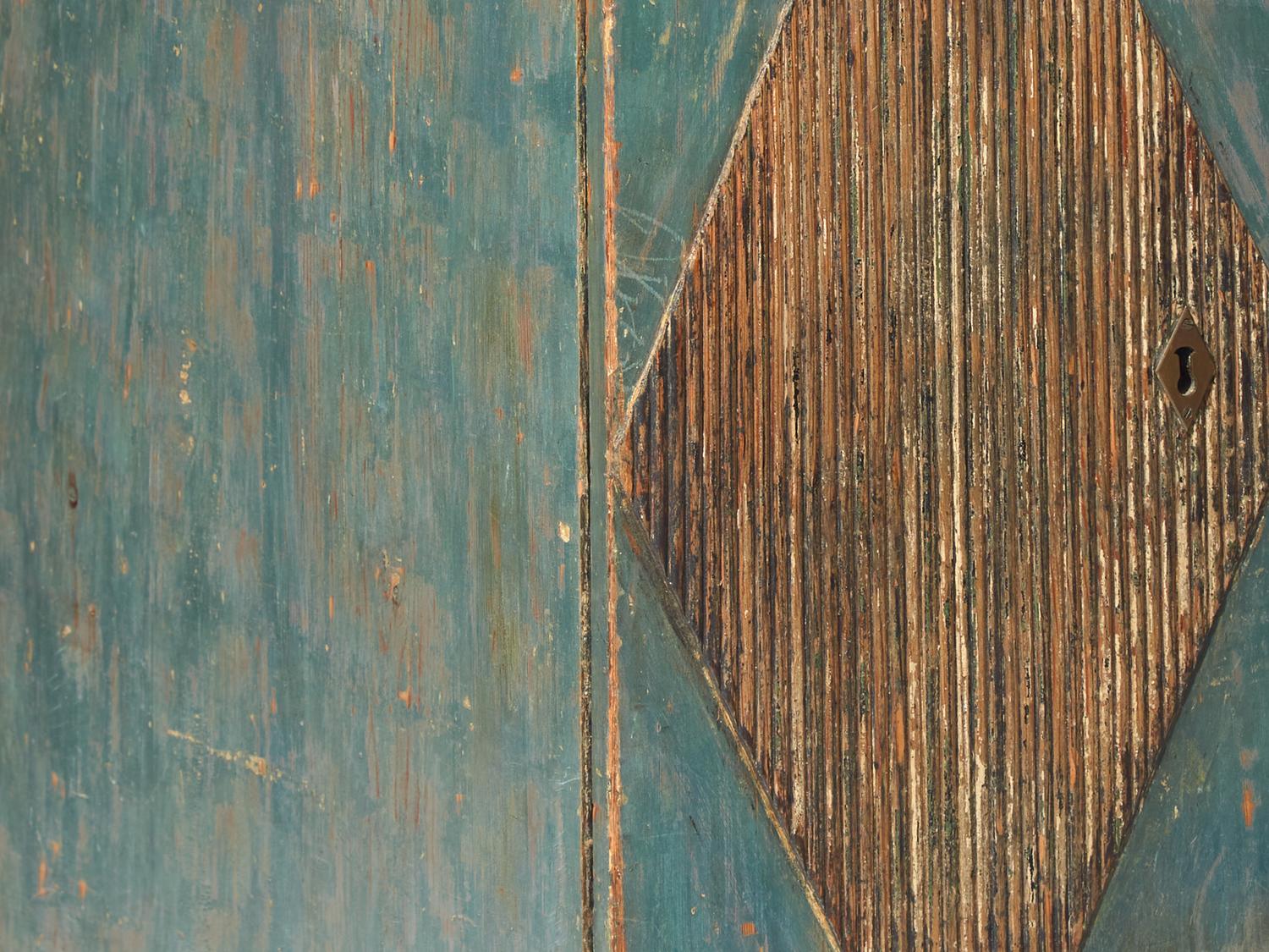 A Rustic Paint-Decorated Kneehole Desk DONATED BY NATE BERKUS