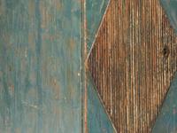 A Rustic Paint-Decorated Kneehole Desk DONATED BY NATE BERKUS