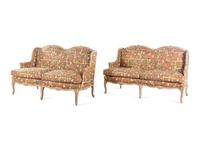 A Pair of Louis XV Style Painted Sofas