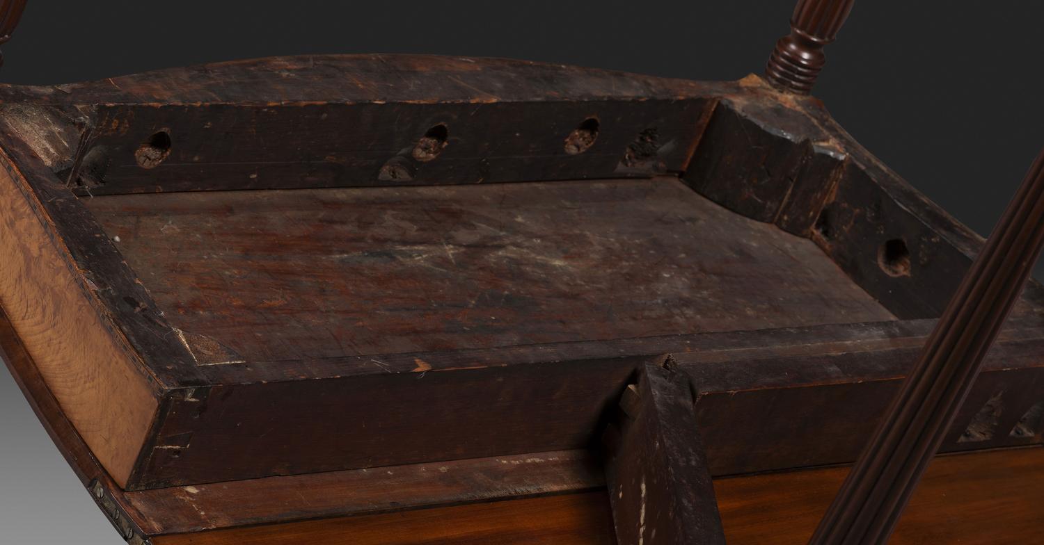 A Federal Birch Veneered and Inlaid Mahogany Serpentine-Top Games Table