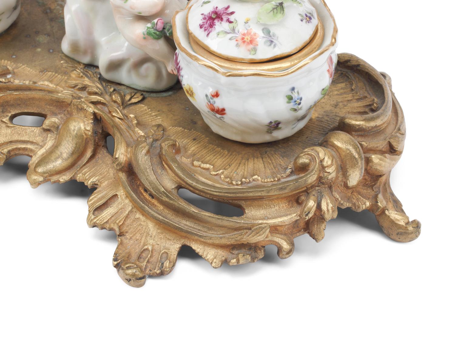 A French Gilt Bronze and Porcelain Inkwell