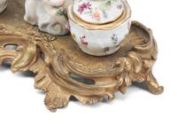 A French Gilt Bronze and Porcelain Inkwell