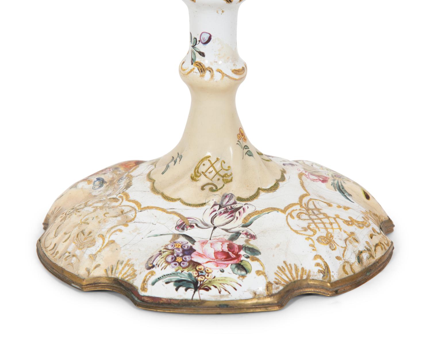 A Pair of Battersea Enameled Candlesticks