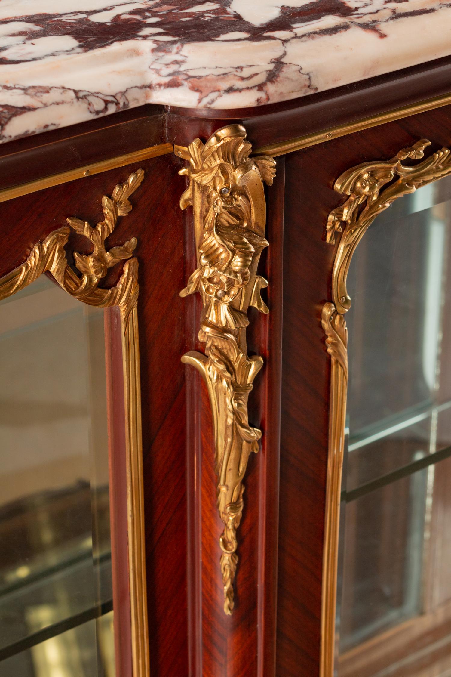 A Louis XV Style Gilt-Bronze-Mounted Tulipwood Vitrine