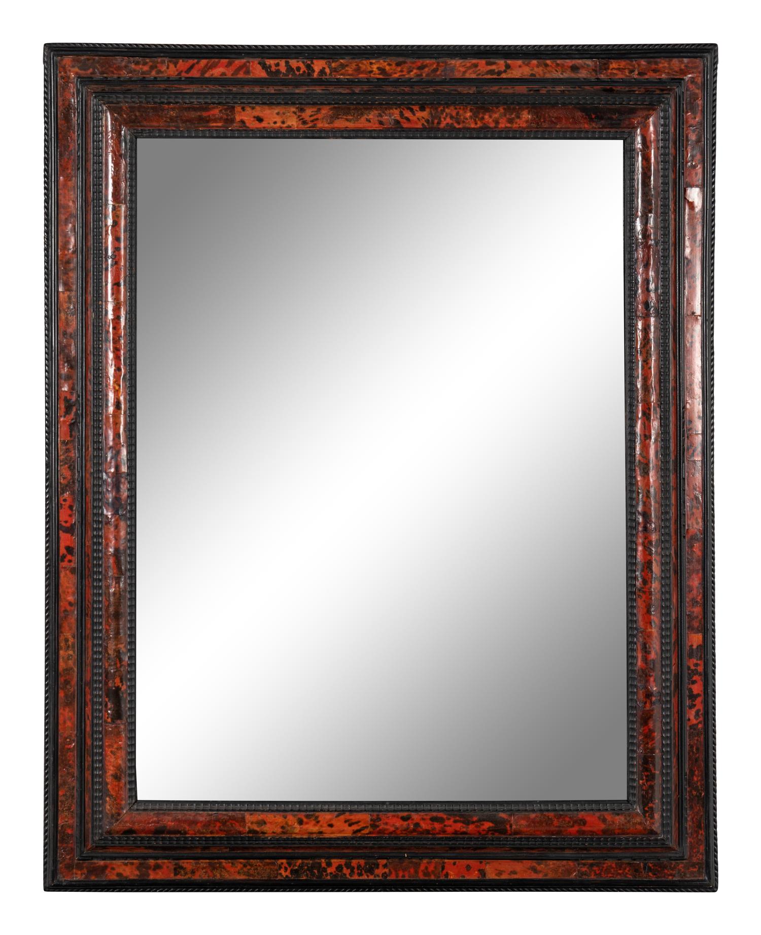 A Dutch Tortoise Shell Veneered and Ripple-Molded Ebonized Mirror