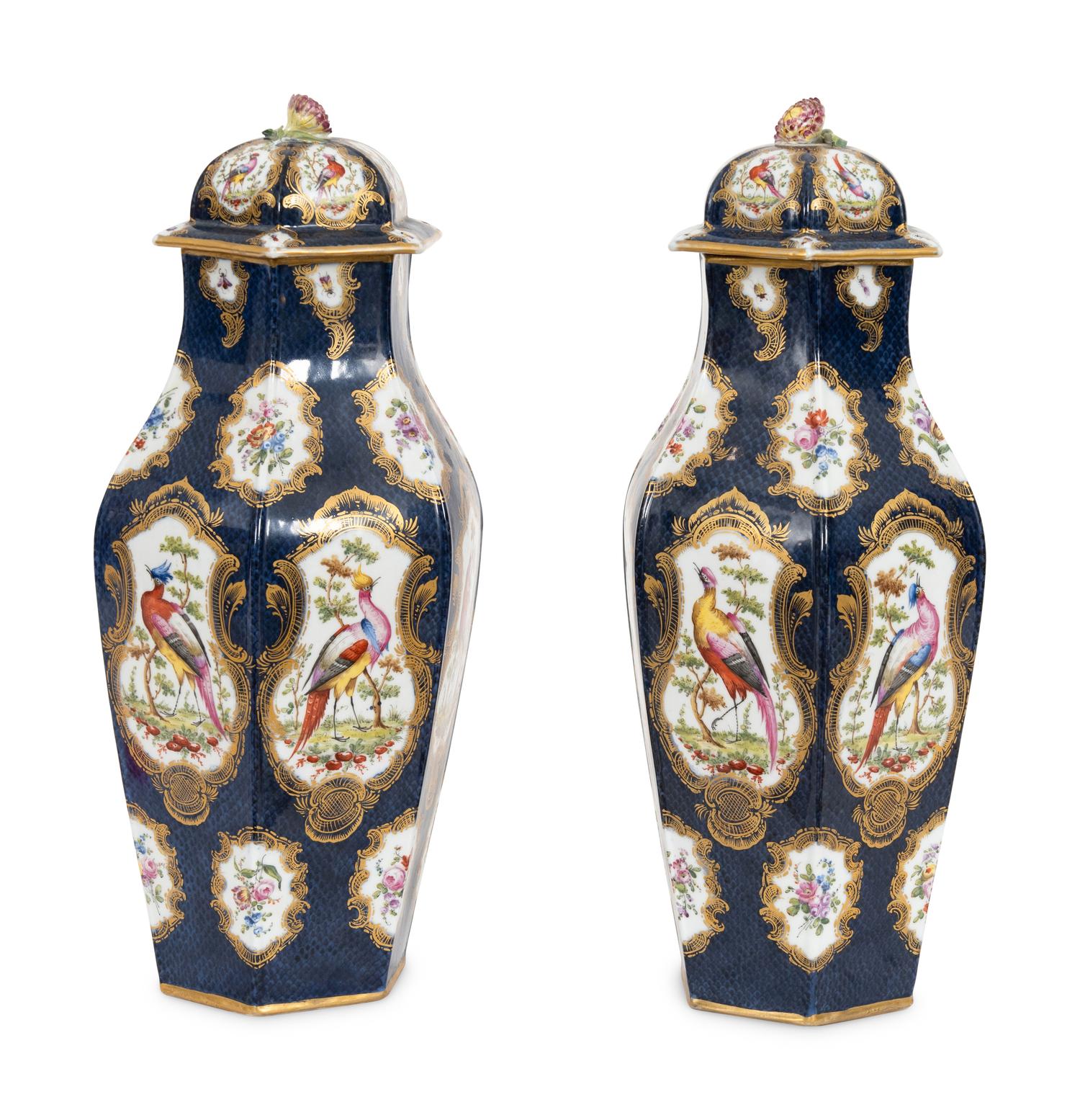A Pair of Worcester Cobalt Ground Parcel Gilt Porcelain Urns