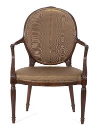 A Regency Carved Mahogany Oval Back Open Armchair Height 36 1/2 inches. — 19TH CENTURY