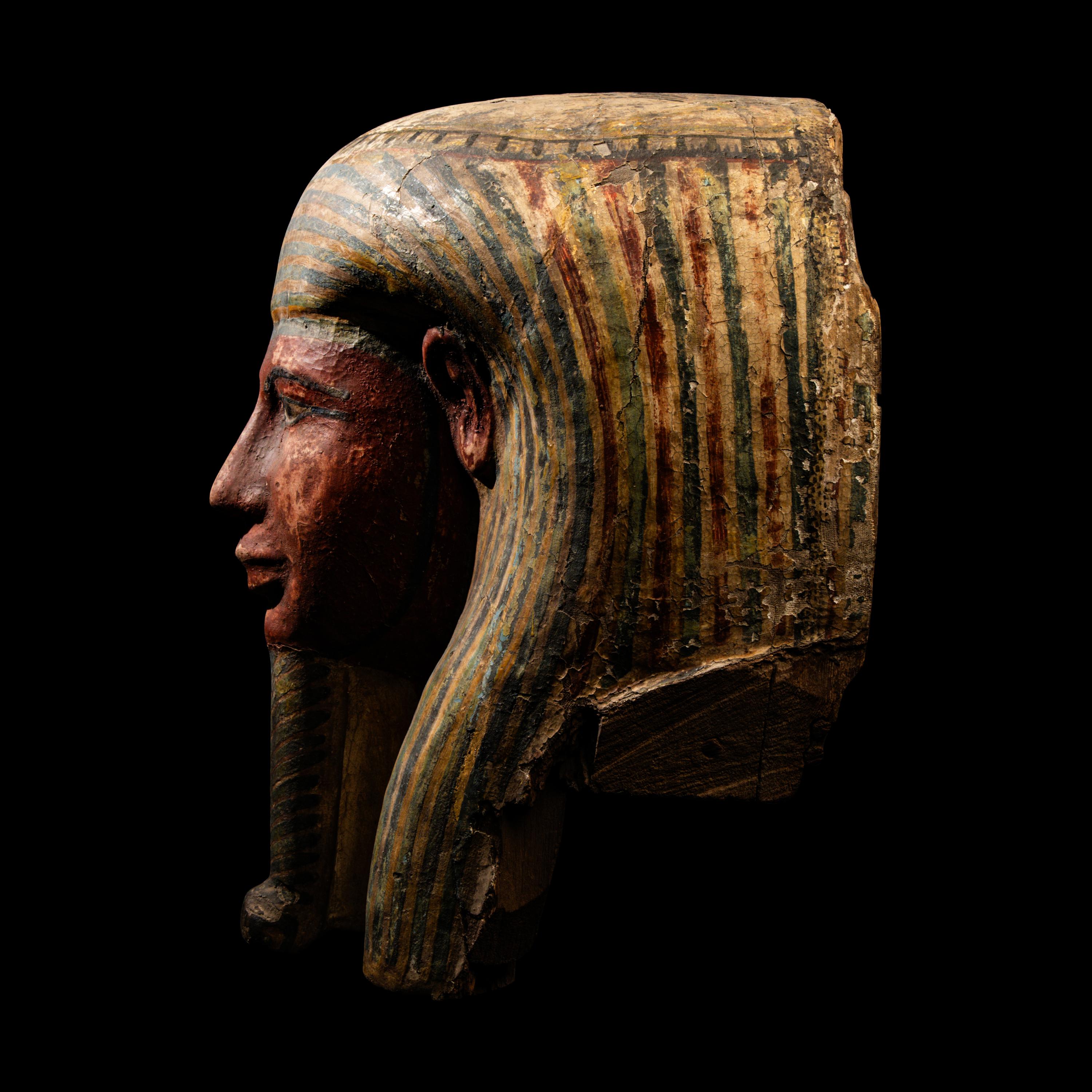 An Egyptian Polychrome Wood Mummy Mask