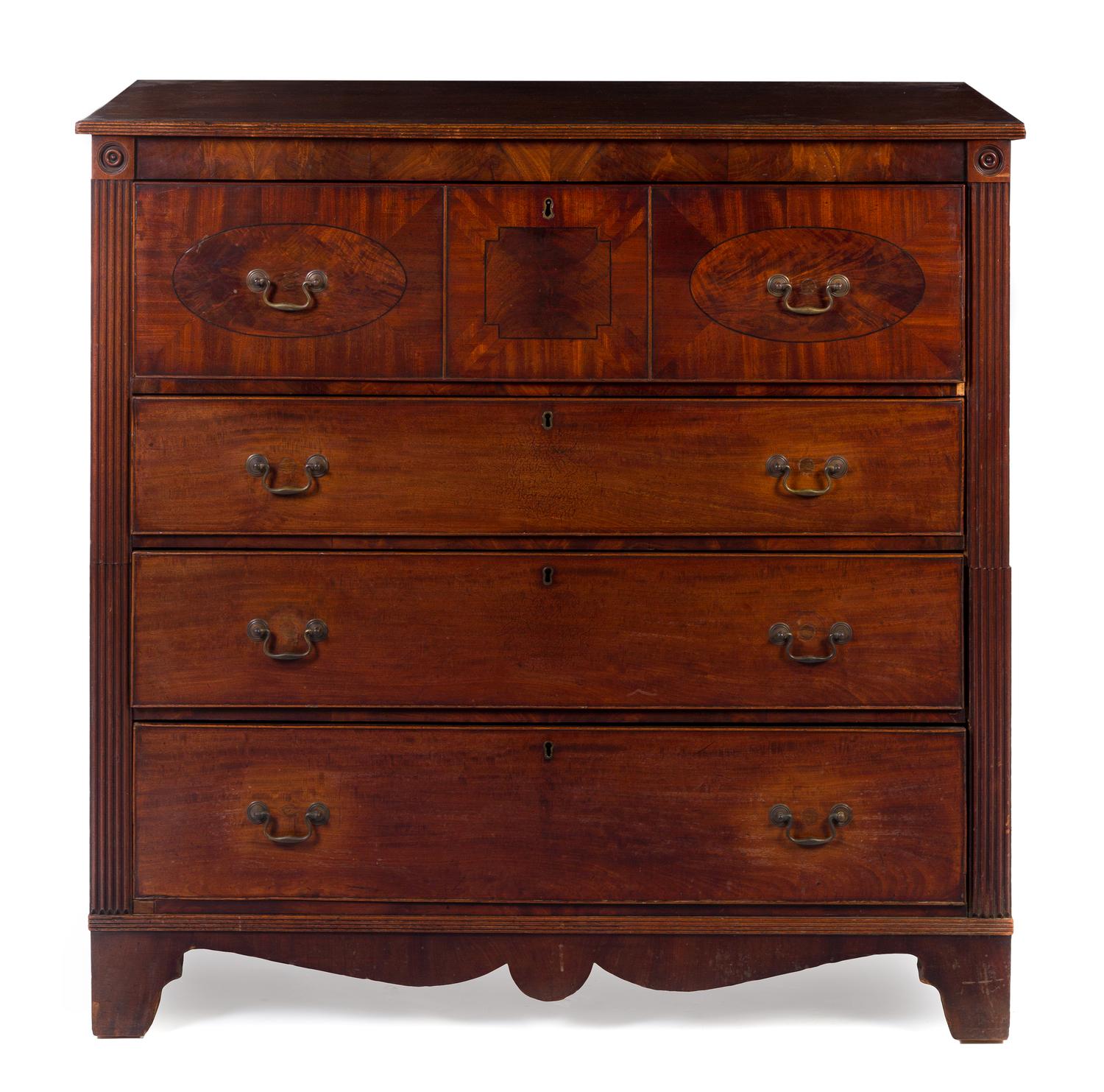 An American Mahogany and Satinwood Bachelor's Chest Height 46 1/4 x width 48 x depth 42 inches. — CIRCA 1810