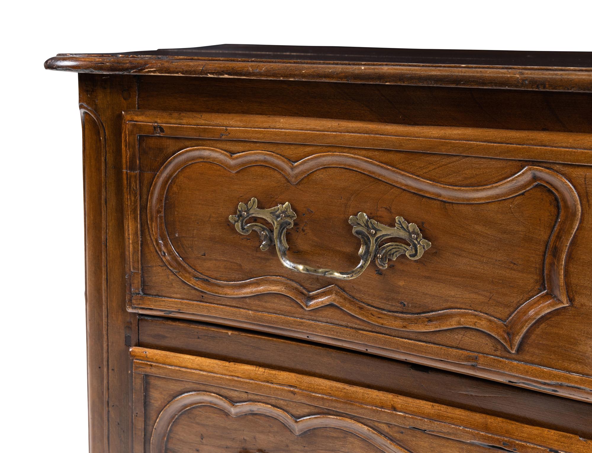 A Louis XV Walnut Commode