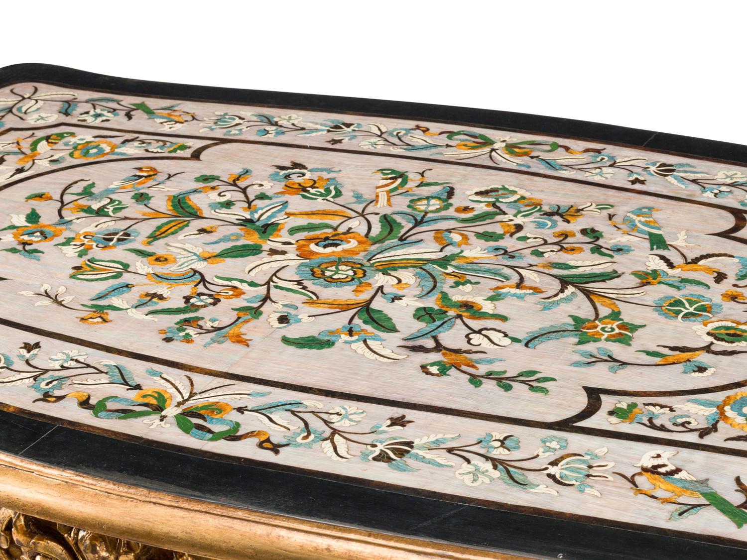 A Louis XV Style Carved Giltwood and Scagliola Table