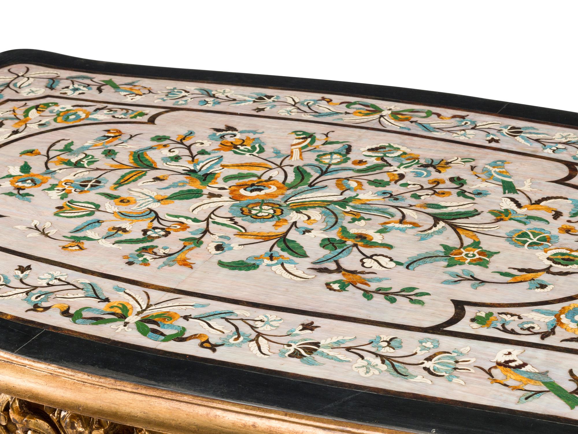 A Louis XV Style Carved Giltwood and Scagliola Table