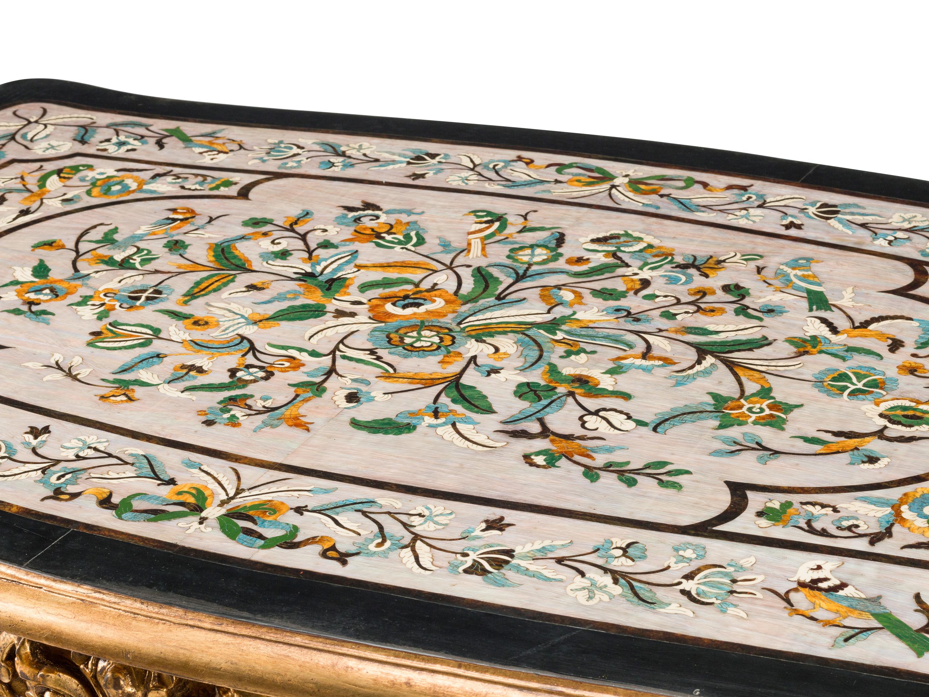 A Louis XV Style Carved Giltwood and Scagliola Table