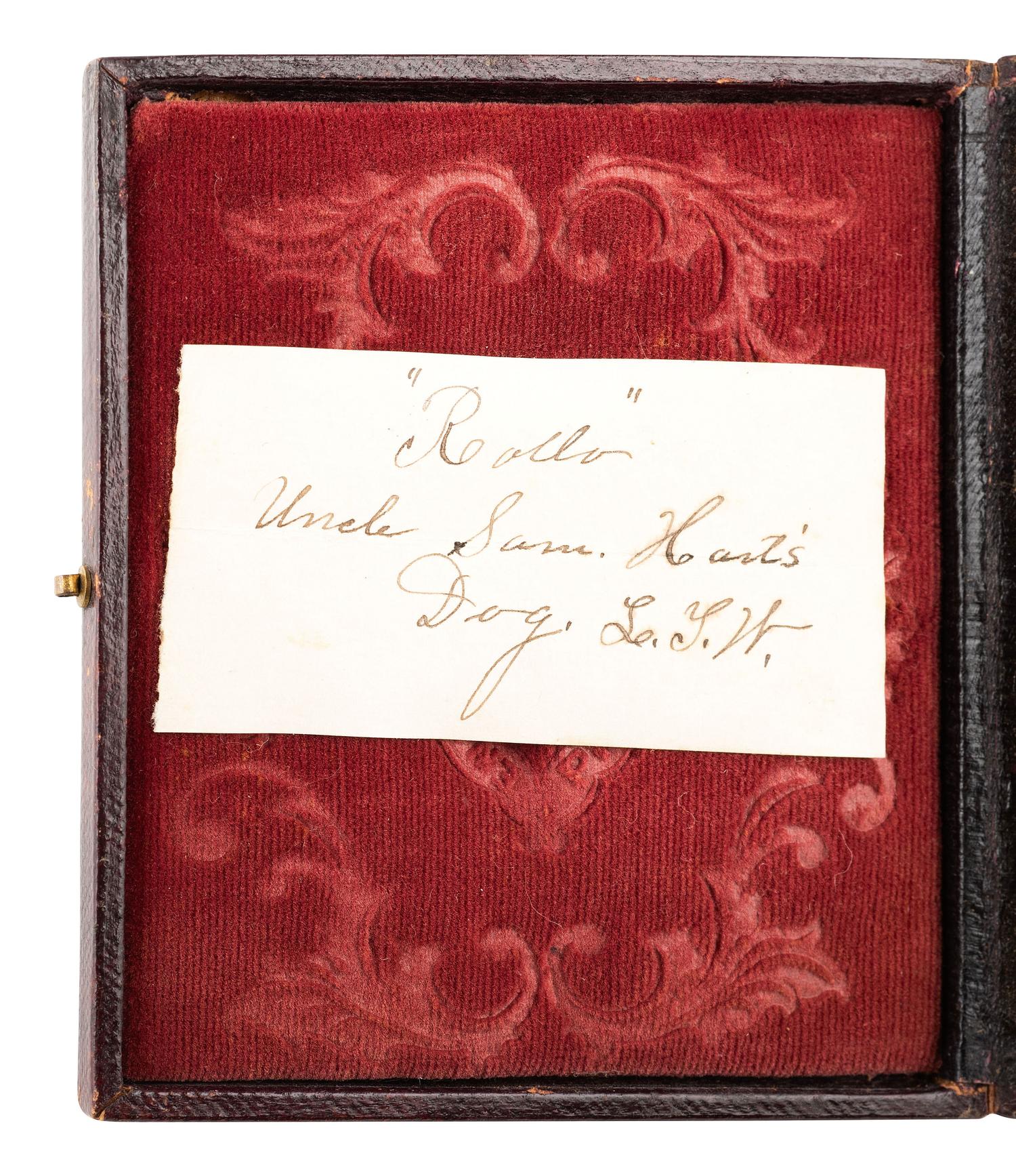 [EARLY PHOTOGRAPHY]. Sixth plate daguerreotype featuring a dog named "Rollo" resting on a table.