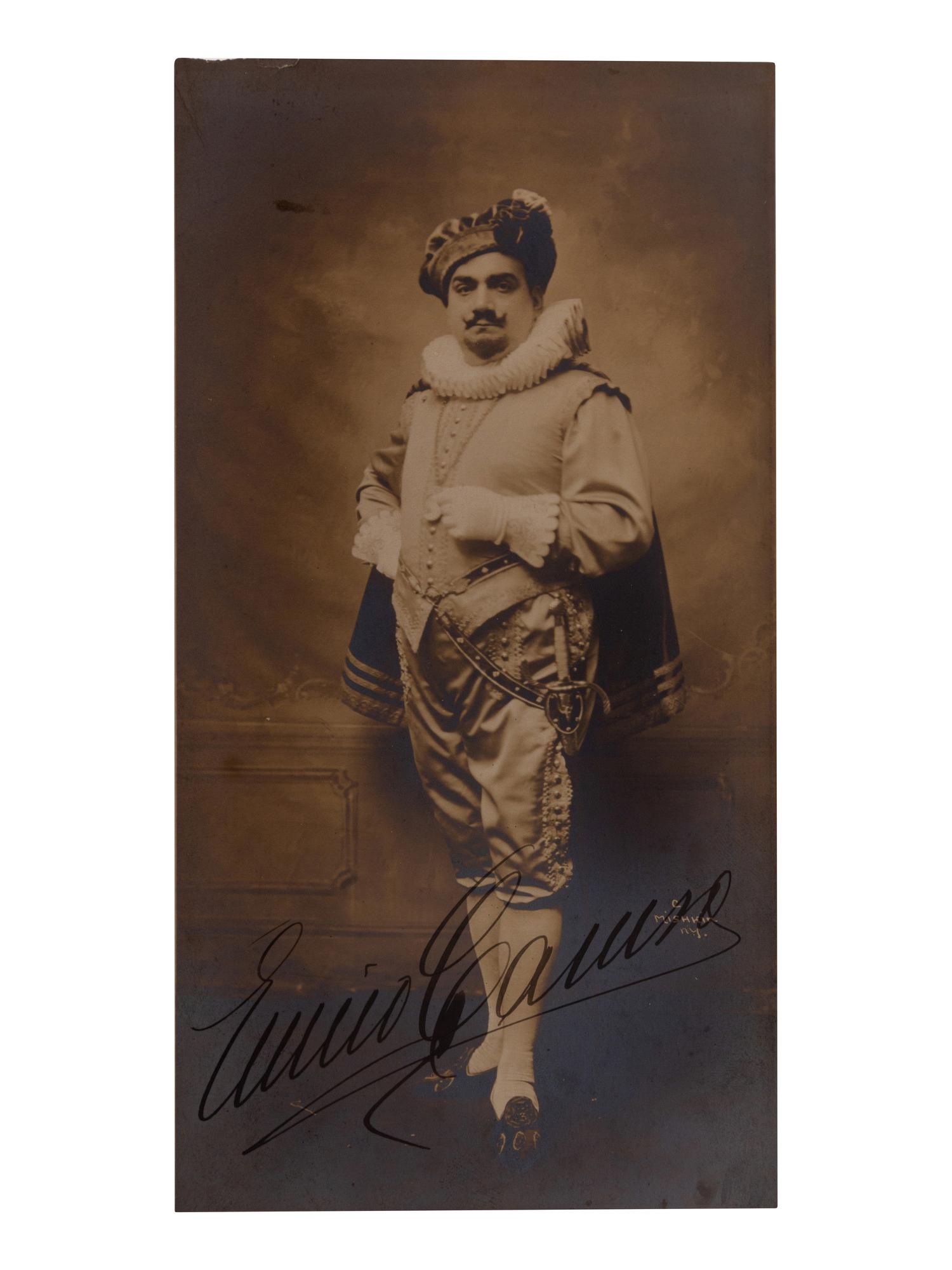 CARUSO, Enrico (1873-1921). Sepia photographic portrait signed (“Enrico Caruso”), by Mishkin, n.d.
