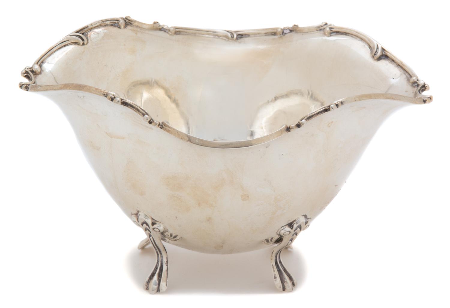 An American Silver Oval Footed Bowl, Unknown Maker, having a scrolled border