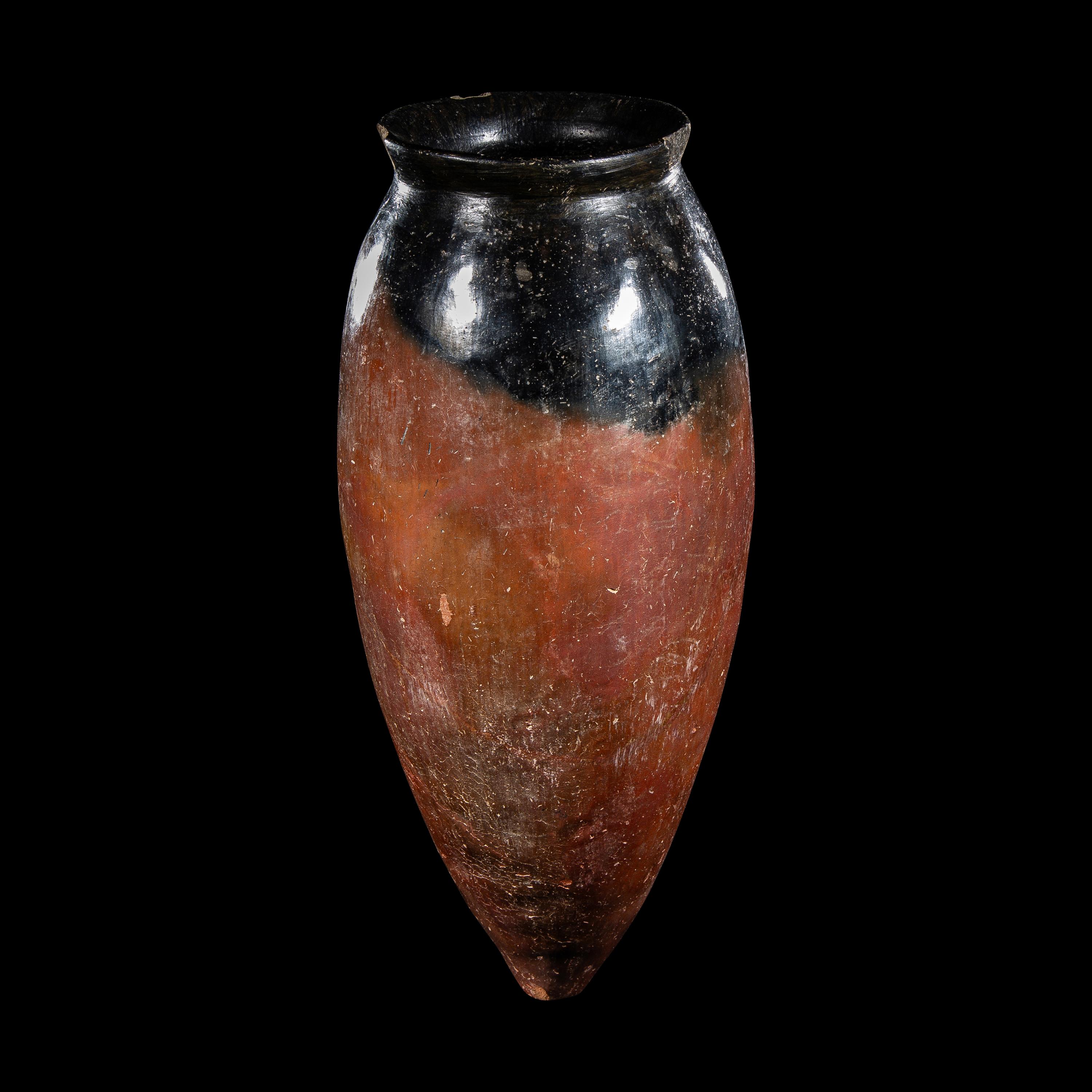 An Egyptian Black-Topped Redware Jar