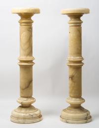 A Pair of Stone Pedestals Height 34 inches.