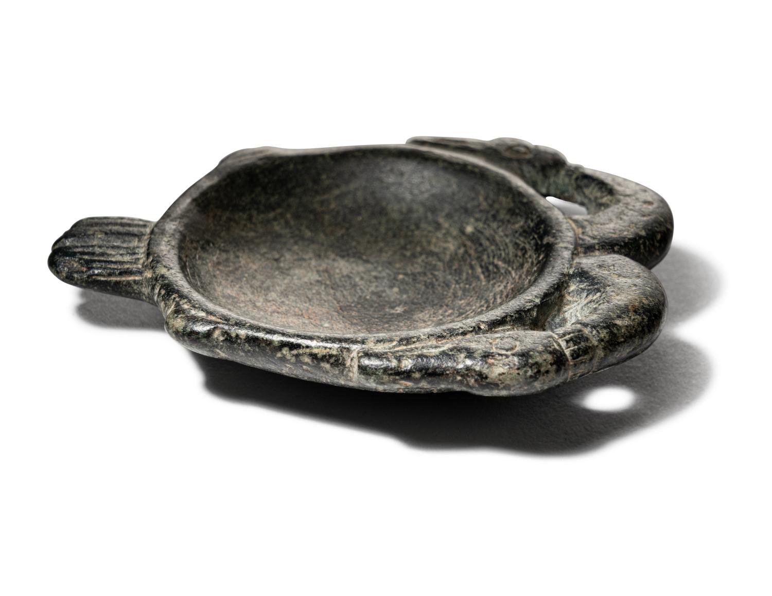 An Egyptian Steatite Cosmetic Palette in the Form of a Double Duck